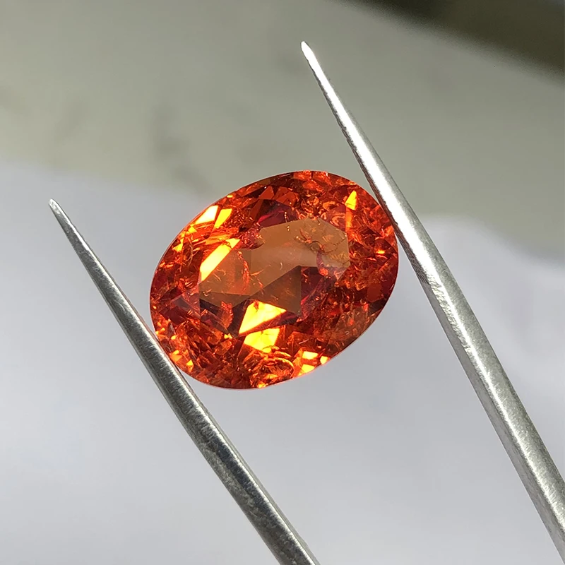 13.5ct  Artificial sapphire oval shape natural cut orange  color including minor cracks and inclusions corundum loose gem stone