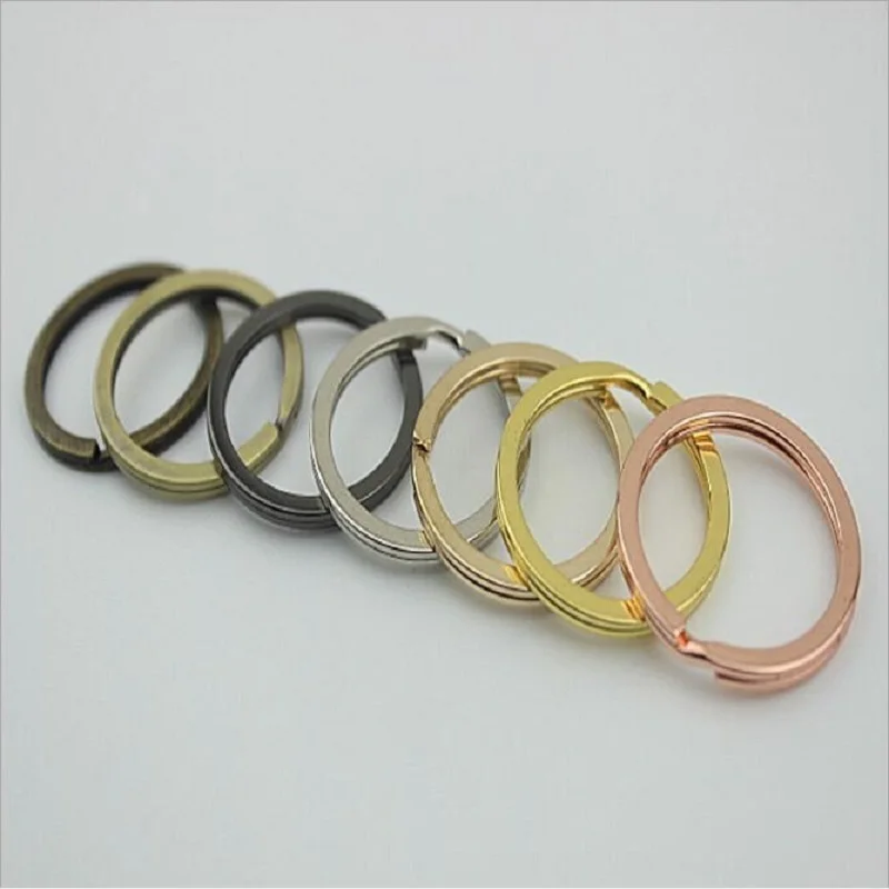 

50pcs/lot new 7 color hair ball pendant metal key flat wire ring DIY decorative handbag pendant hardware accessories