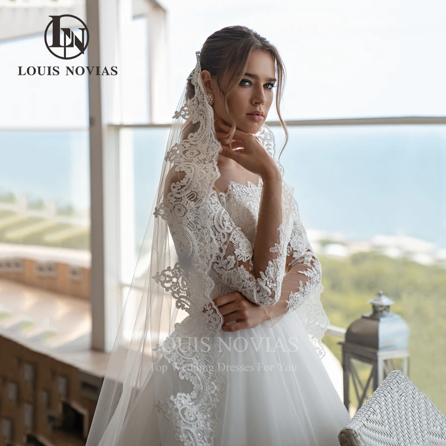 LOUIS NOVIAS vestido de novia corte a Sexy elegante con hombros descubiertos manga larga Apliques de encaje cuello barco vestido de novia de princesa