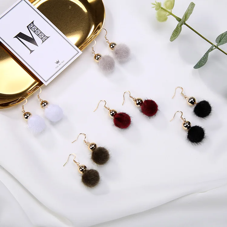 Korean version of the new earrings cute sweet metal ball tassels autumn and winter long paragraph pompom fashion girls jewelry