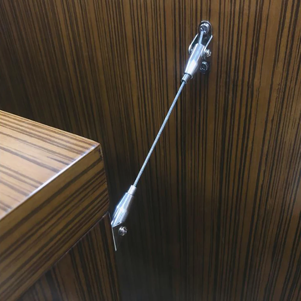 Botón antibobinado ajustable para mueble de TV, soporte de Metal con correa antibobinado, para gabinete, juego de 5 unids/set