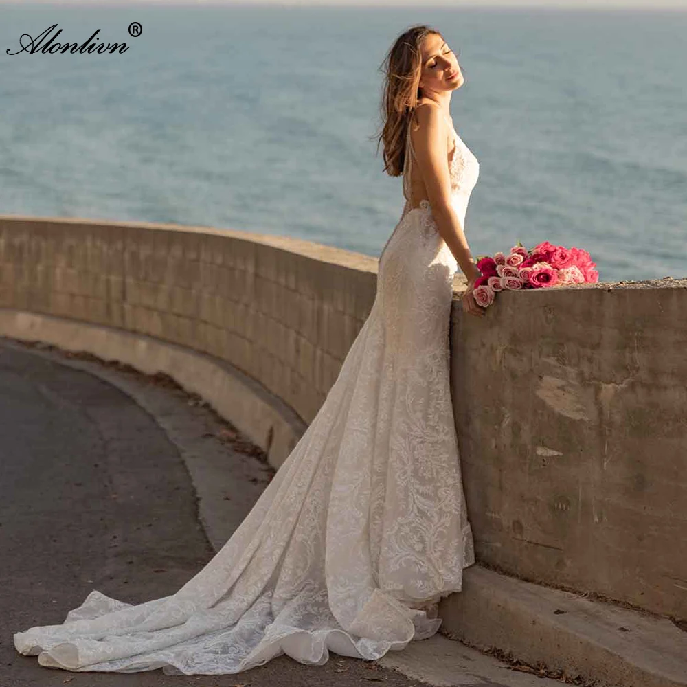 

Alonlivn Unique Embroidery Lace Trumpet Wedding Dress Beading Pearls Spaghetti Straps Deep V-Neck Mermaid Bridal Gowns