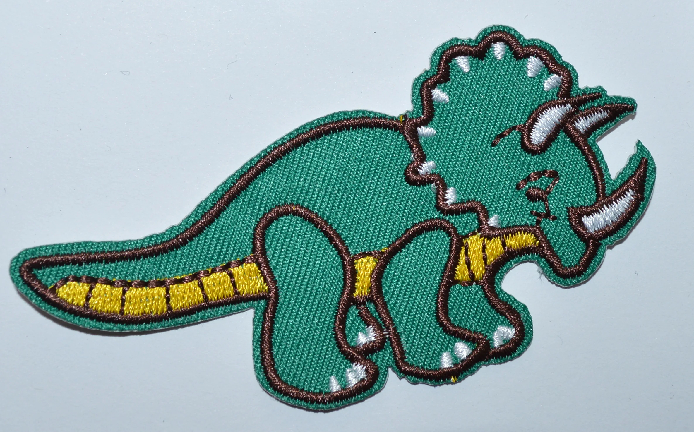 Hot! Triceratops dinosaur Jurassic Animal Wild Life embroidered applique iron on patch (≈ 8.9 * 4.3 cm)