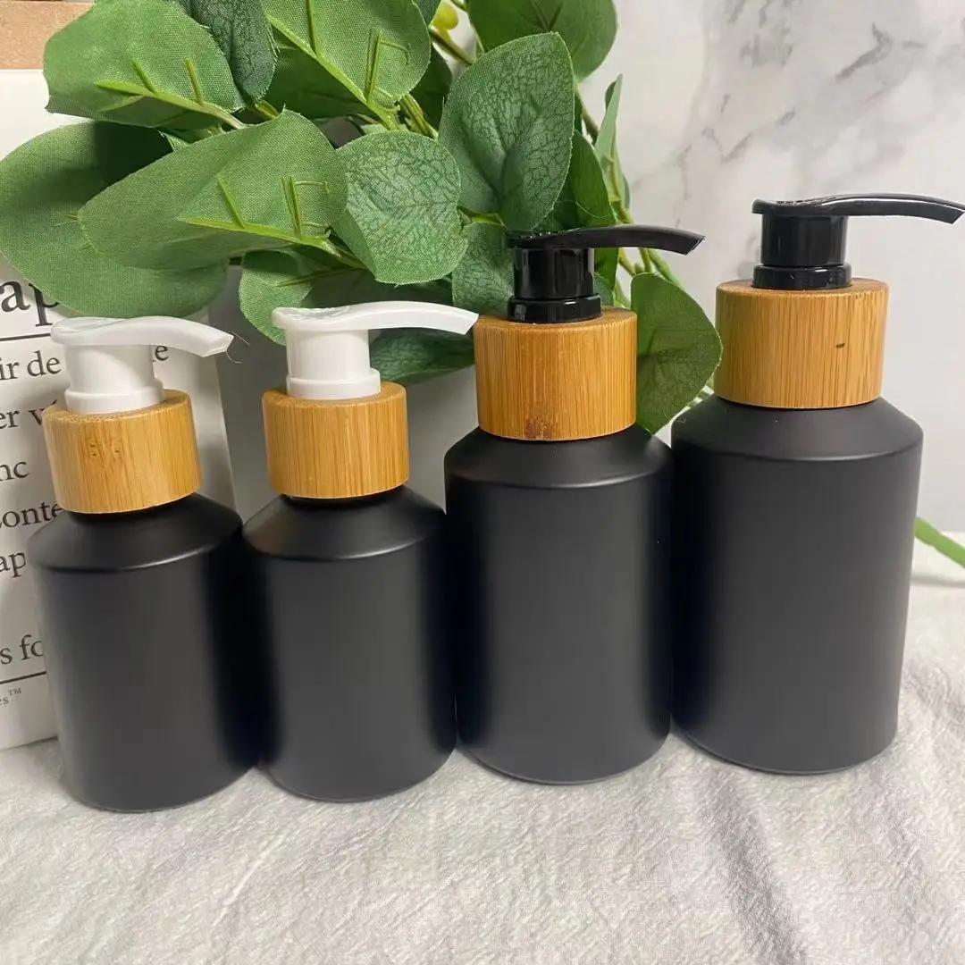 

2 oz 60ml 100ml Black frosted Glass Spray Bottle Pump Bamboo Shampoo Cap lotion Pump lid, Bamboo Cosmetic Packing For Liquid Oil