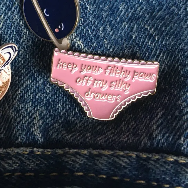 Keep your filthy paws off my silky drawers' enamel pin