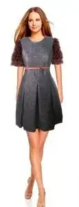 High-cut dress with short sleeves made of long curl wool fabric. Wide skirt with folds. Clothing for woman