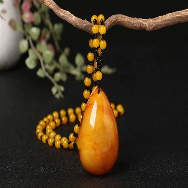 Old beeswax pendant menwomen chicken butter amber long necklace national style pendant Gourd waterdrop craft carving certificate