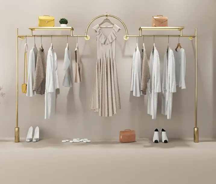 Stainless steel and titanium clothes shelf hanging on the wall of clothing store display shelf