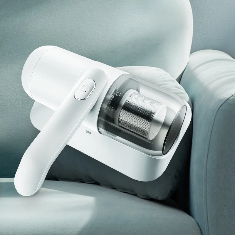 EU 1007 Home Handheld Wireless Mite Eliminator Small UV Vacuum Cleaner on Bed