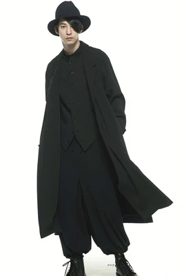 Cappotto a maniche lunghe da uomo primavera nuovo cappotto a vento da uomo medio e lungo grande cappotto Casual semplice nero alla moda retrò