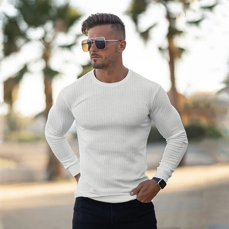 Suéteres de cuello redondo a la moda para hombre, jerseys de punto de tiras negras, suéter informal sólido, prendas de punto ajustadas para Otoño e