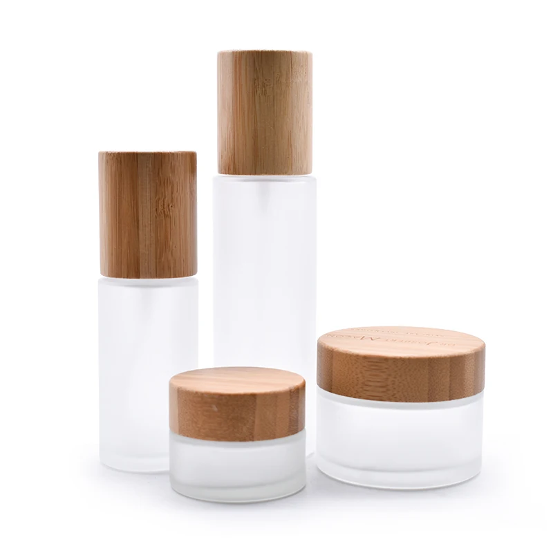 

30ml glass cosmetic perfume essential oil pump caps bamboo lid cap empty glass bottle with mist sprayer bamboo top 50ml 100ml