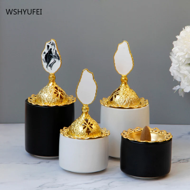 Modern light luxury golden metal matte black and white ceramic incense burner desktop crafts ornaments aromatherapy burner