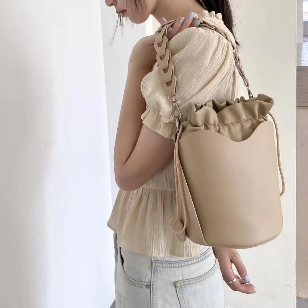 NIGEDU Bucket bag for Women Crossbody Bag Simple design Tassel handbag Drawstring Lady Tote Braided strap Shoulder Messenger Bag