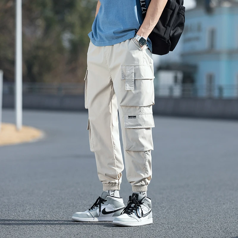 2022 pantaloni Cargo da uomo oversize Streetwear pantaloni sportivi da Jogging da uomo neri pantaloni Harem elastici in vita Casual maschili di grandi dimensioni 5XL