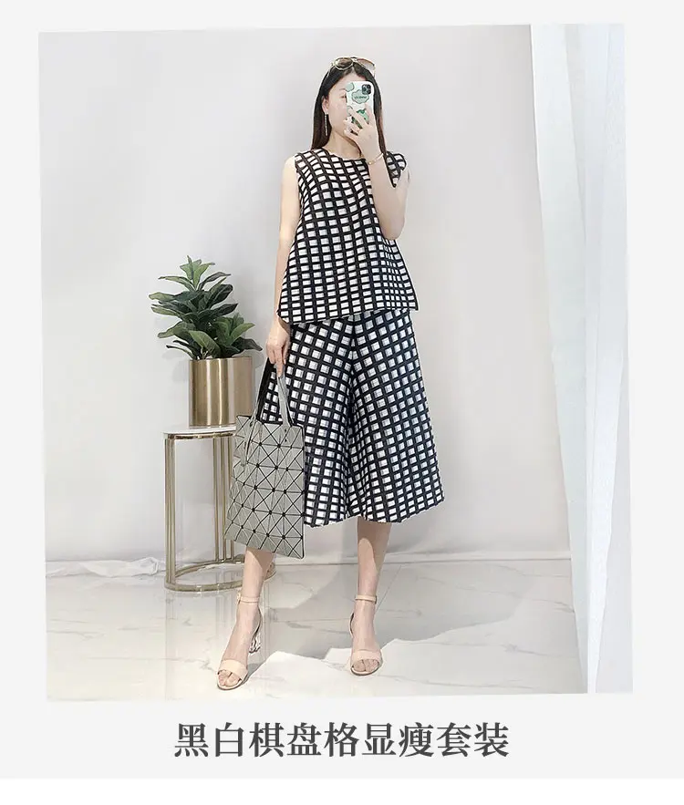 HOT SELLING  Fashion fold sleeveless o-neck T-shirt + Wide leg  pants lattice two-piece outfit IN STOCK