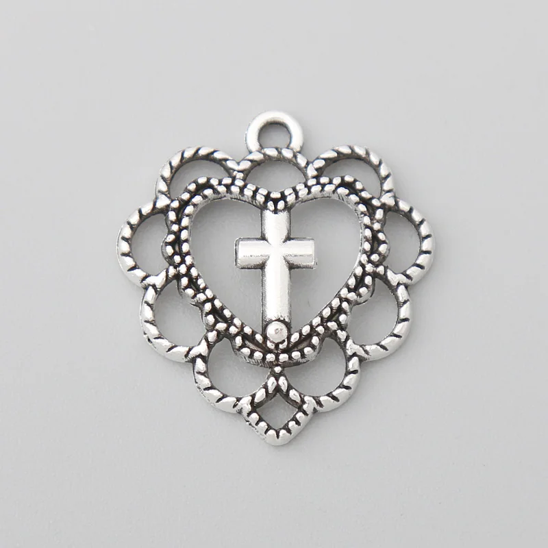 

RAINXTAR Fashion Alloy Hollow Heart Charms Religious Cross Pendant Charms 20*22mm 100pcs AAC514