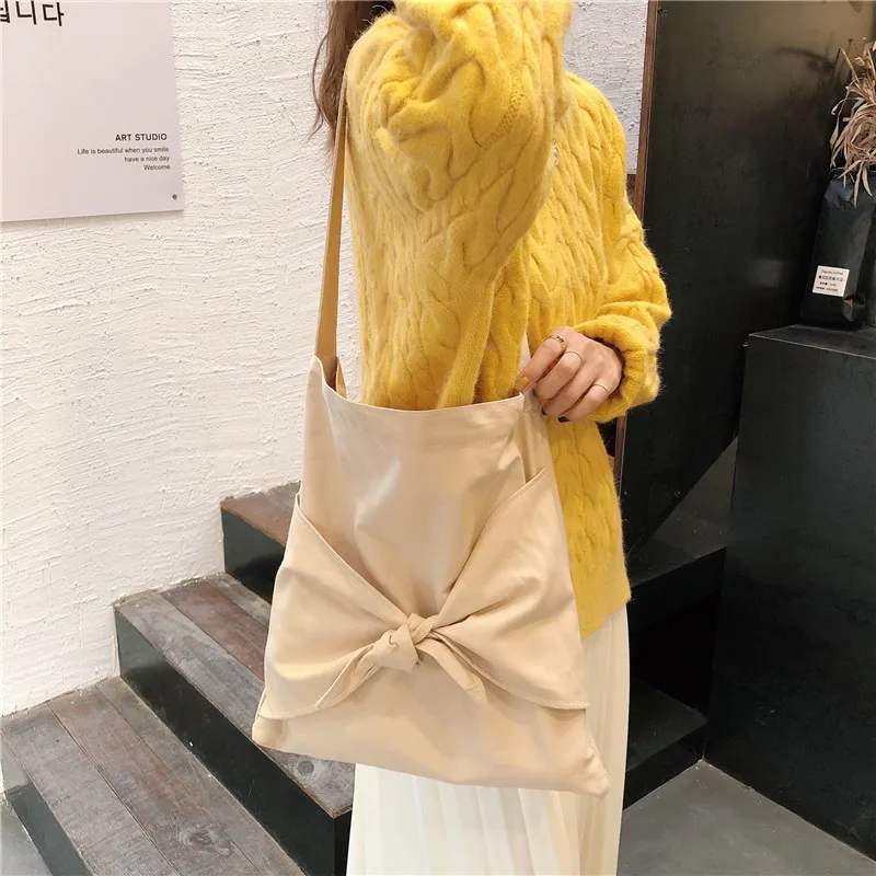 

Korean bowknot girl shoulder bag solid color canvas bag student hand bag foldable shopping bag