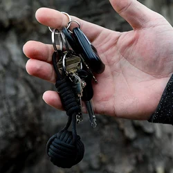 Porte-clés en paracorde de poing de singe de lanière d'autodéfense, boule en acier inoxydable, survie en plein air, défense personnelle