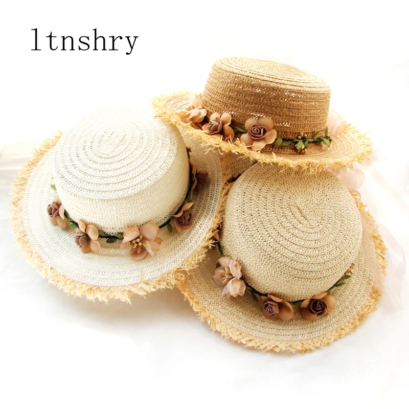 

Parent-child women hat sun hat Panamanian style Visor girl hat With flowers bow straw tassel hat Foldable Ribbon cap Mujer
