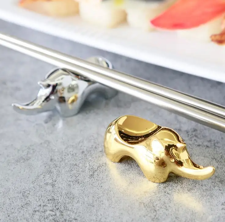 

100pcs Creative Chinese Style Gifts Stainless Steel Animal Golden Silver Rhino Chopsticks Fork Holder Kitchen Tableware Tools SN