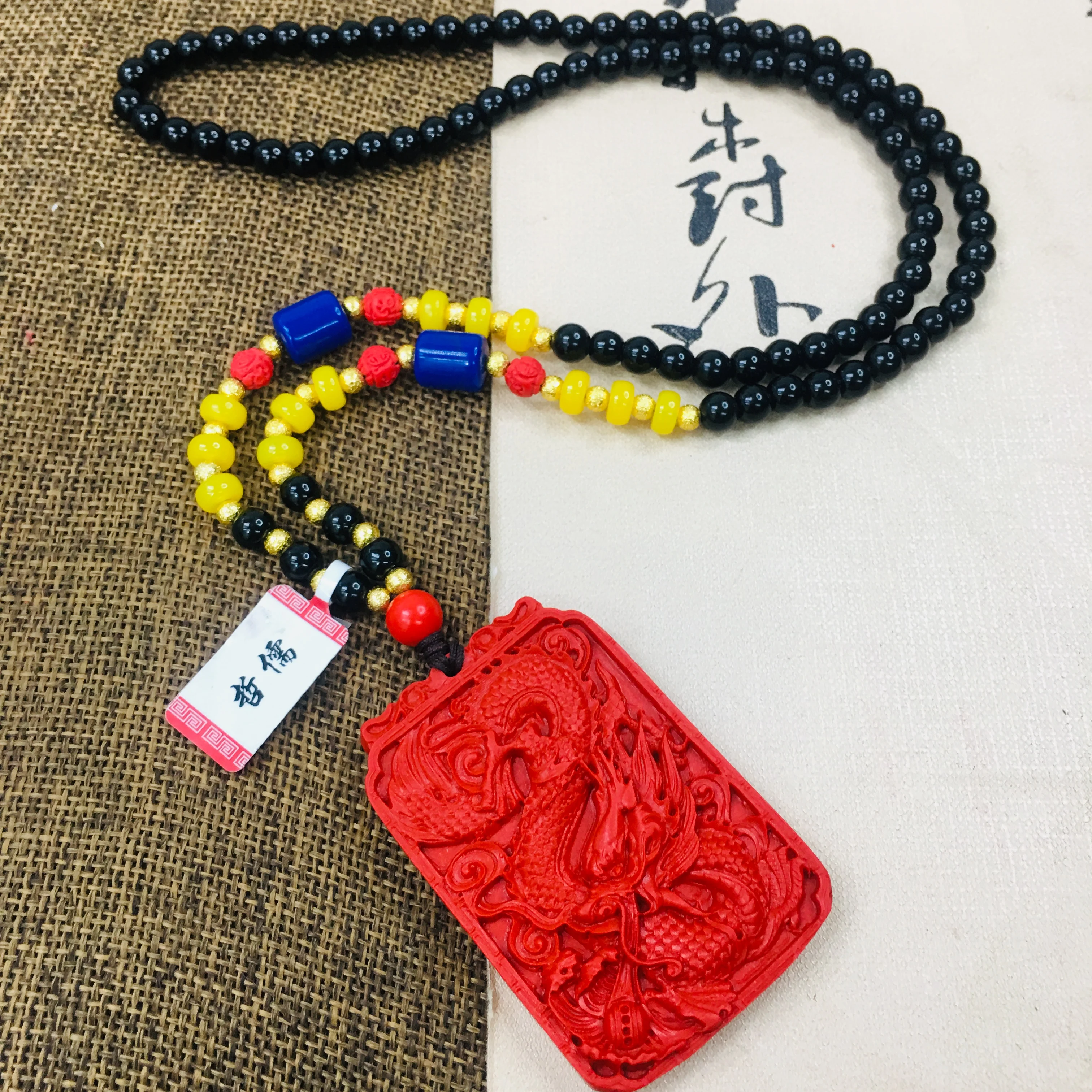 

Zheru natural cinnabar carved red retro dragon pendant with cinnabar bead necklace men and women sweater chain