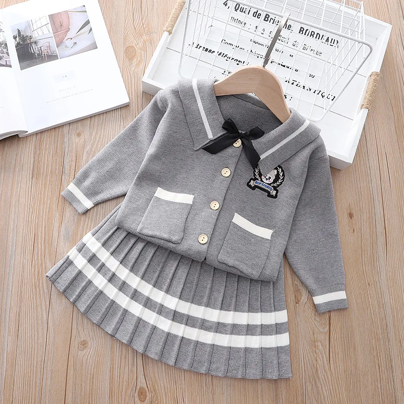 Autunno ragazza College Style maglione Set bambini coreano simpatico orso ricamato Cardigan gonna a pieghe scuola due pezzi Set