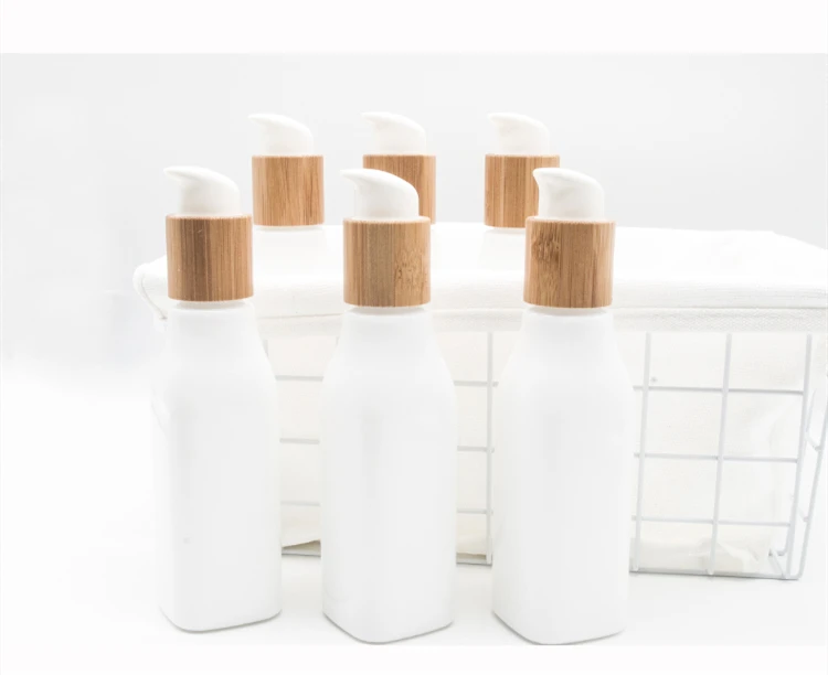 

Bamboo Porcelain white Cosmetic glass bottle skincare lotion with bamboo Pump lid 100ml 120ml face cream serum lotion bottle