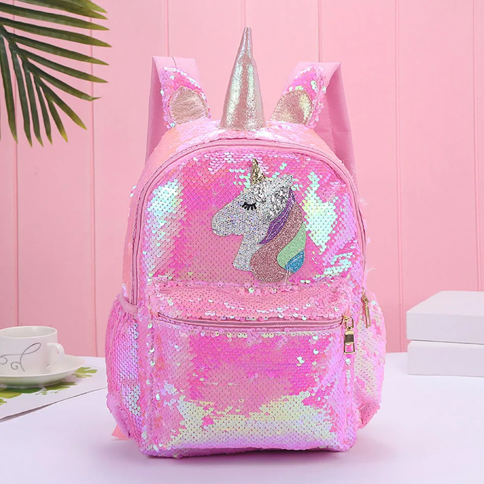 Moda kız Sequins Unicorn sırt çantaları çocuklar için PVC Mermaid parlak ışık okul çantaları kız ve erkek karikatür omuz çantası