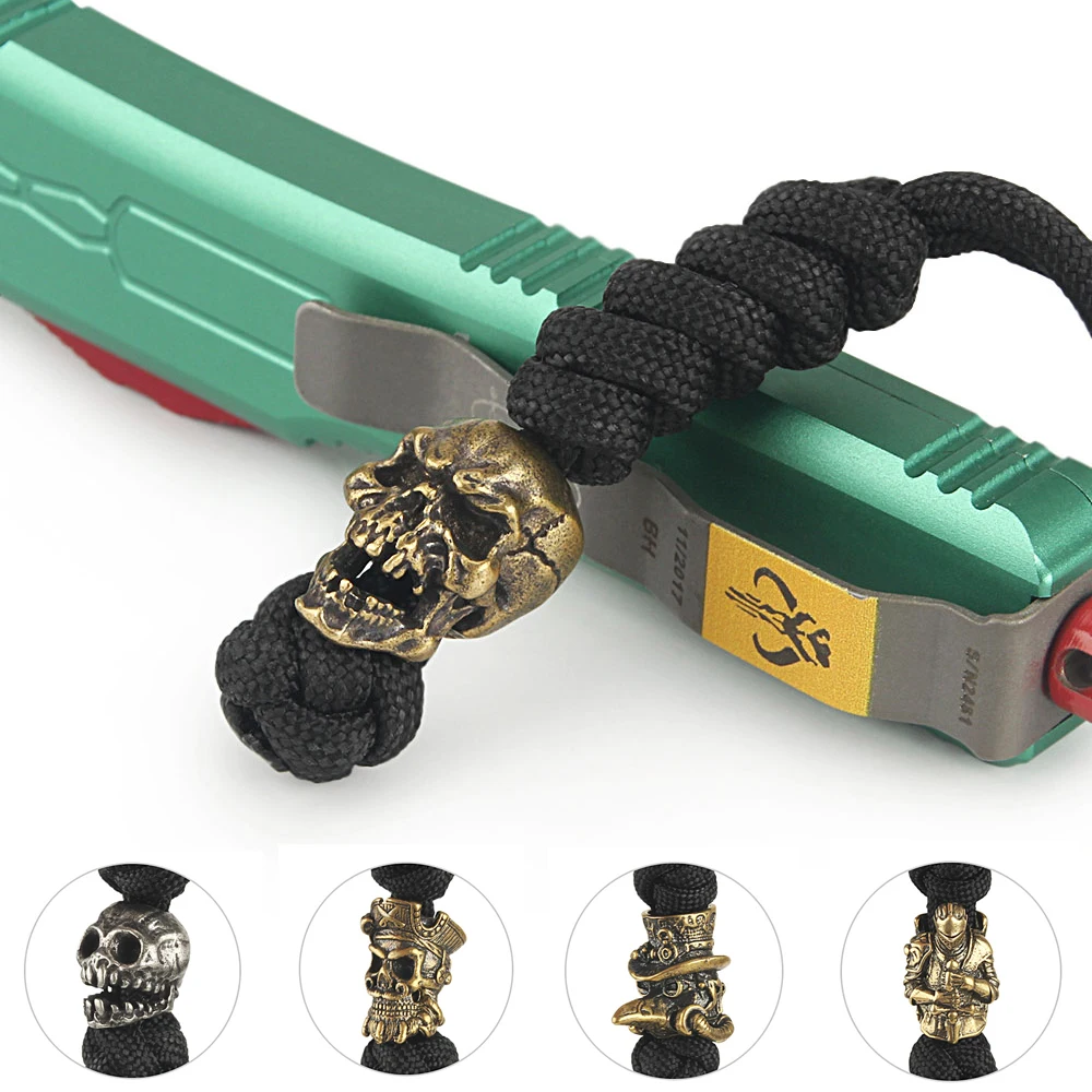Cuentas de cuchillo de calavera de latón tejido, cuentas de cuerda de paraguas, cuentas de Paracord tejidas a mano, colgante