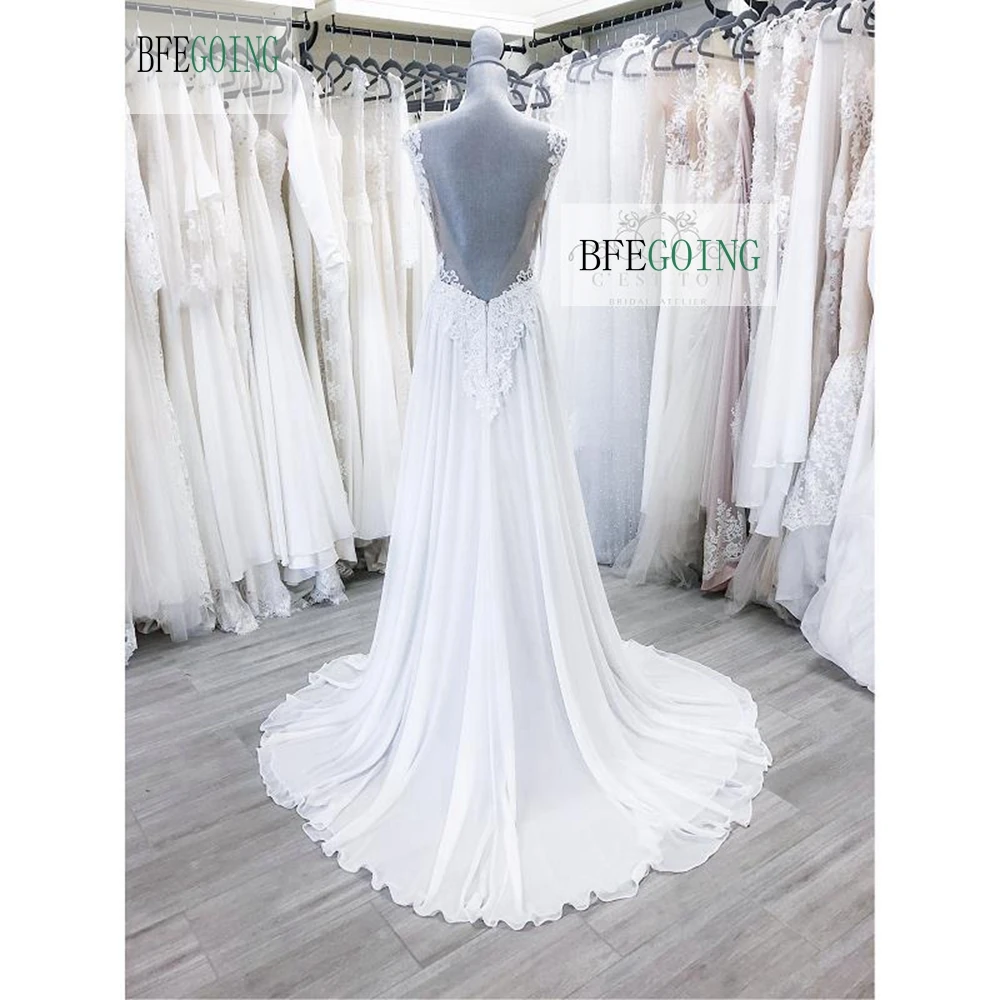 Abiti da sposa senza maniche in Tulle di pizzo in Chiffon bianco abito da sposa a trapezio lungo fino al pavimento