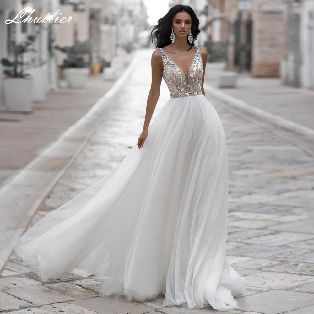 

Lhuilier Customized A Line V Neck Beaded Wedding Dresses Sleevelss Floor Length Backless Bridal Gowns