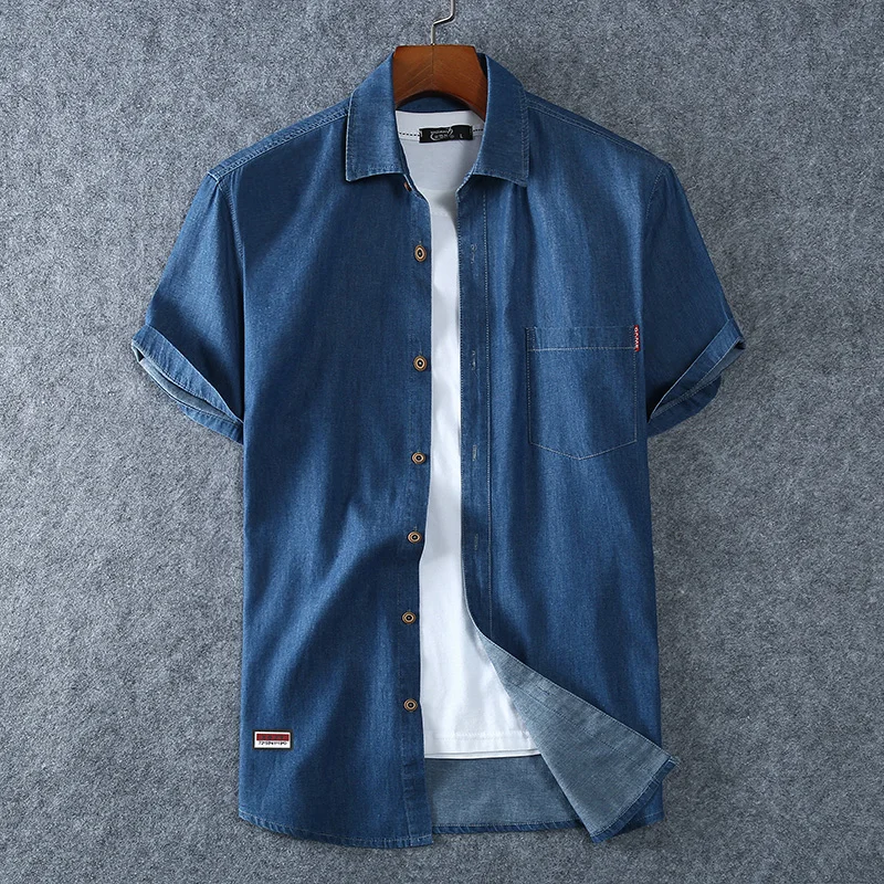 Męskie niebieskie koszule jeansowe z krótkim rękawem Nowe letnie wysokiej jakości męskie bawełniane jasnoniebieskie koszule jeansowe Plus rozmiar L-8XL
