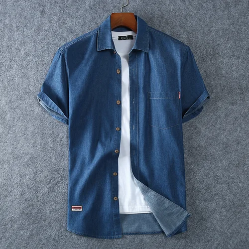 Imagen 1 del producto Camisas vaqueras azules para hombre, camisas vaqueras de manga corta, nuevas camisas vaqueras de algodón azul claro de alta calidad para verano, L-8XL de talla grande