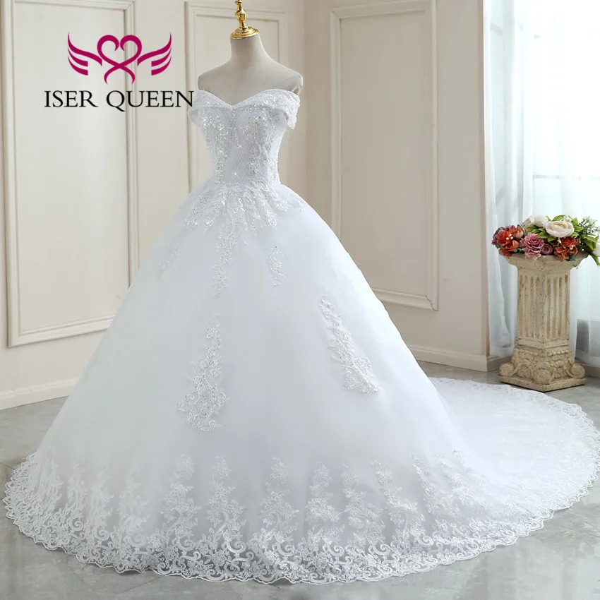 คริสตัลลูกปัดลูกไม้ที่กําหนดเองเจ้าหญิงงานแต่งงานชุดหมวกแขน Appliques Chapel Train ชุดแต่งงาน WX0261