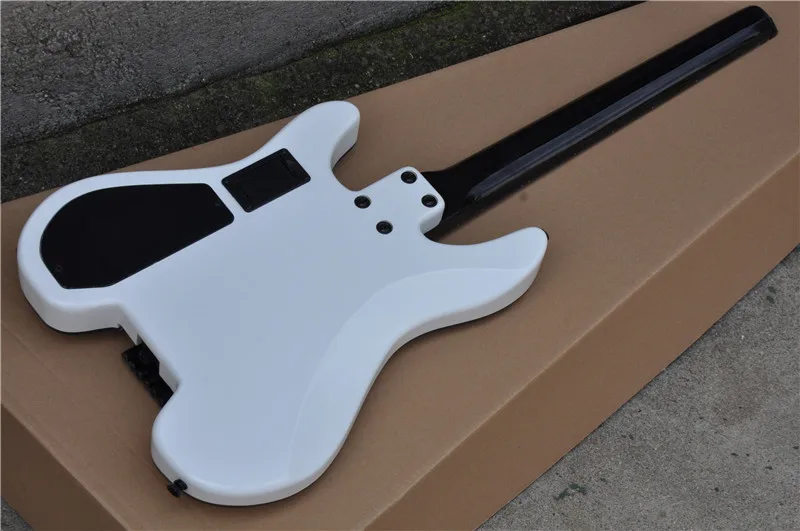 Eagle. Butterfly, electric guitar, electric bass, custom instrument shop .Headless Electric Guitar Steinberg White Guitar