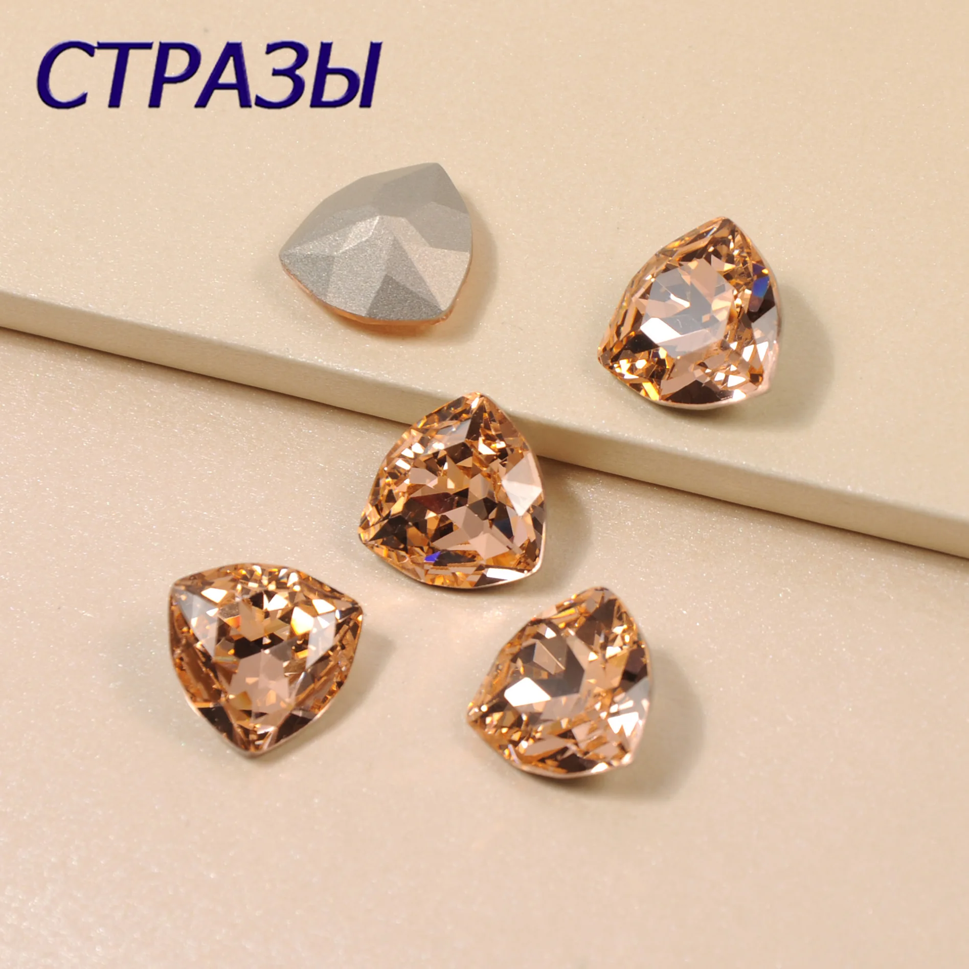 

Light Peach Trilliant Sew On Rhinestone With Claw Setting Gold Back Fancy Stone Rhinestone Applique For Jewelry Dance clothes
