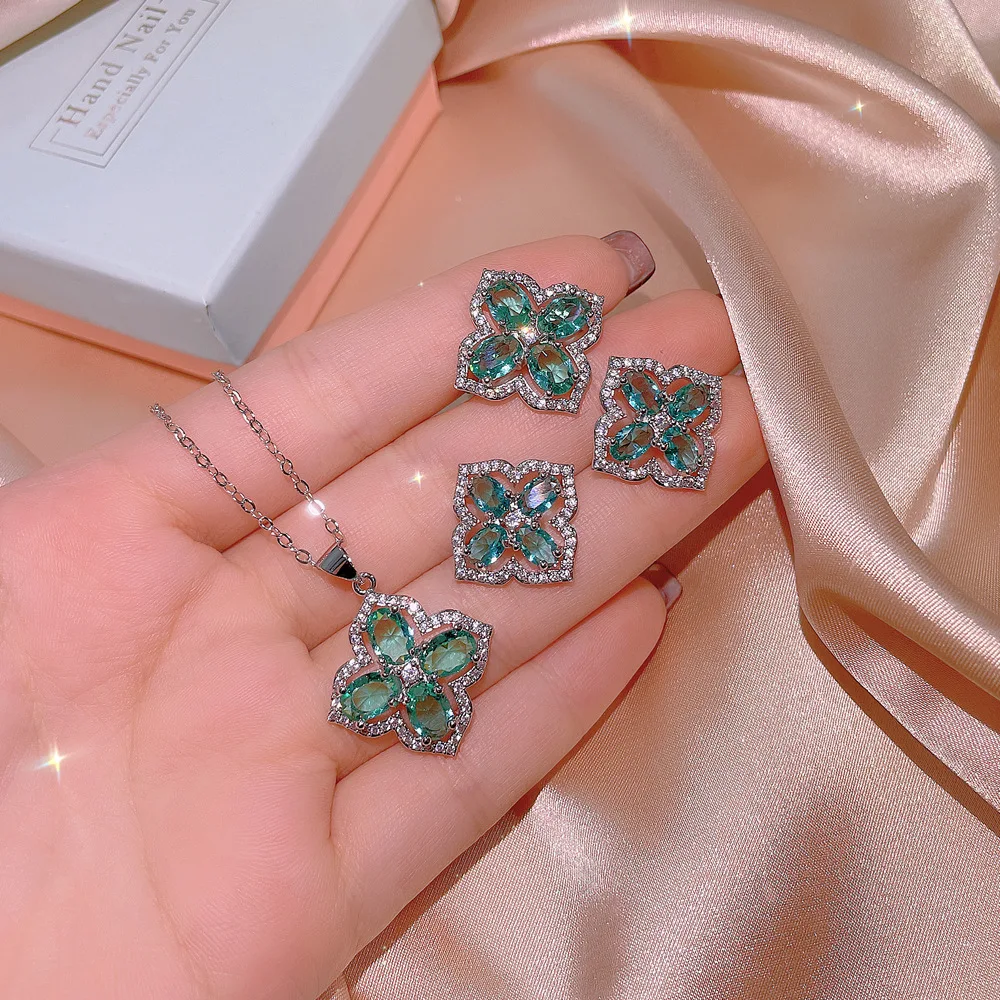 New inlaid and cultivated emerald four-leaf clover zircon necklace ring earrings three-piece set party birthday jewelry gift