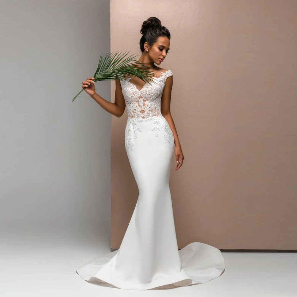 Abito da sposa senza schienale a sirena maniche ad aletta scollo a V applicazioni economici trasparenti Sweep Train Beach abiti da sposa Robe personalizzato