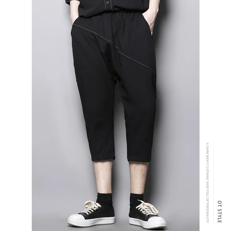 

Irregular splicing loose car line in summer, small foot hanging low-grade casual Capris, Harlan pants, pipe pants, men's fashion