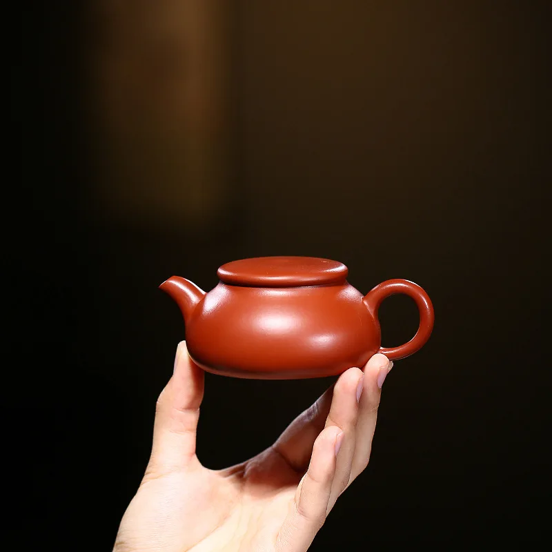 

Yixing purple clay teapot pure handmade by famous raw ore Dahongpao Chaoshan sketch 130cc teacher Jin purple clay teapot