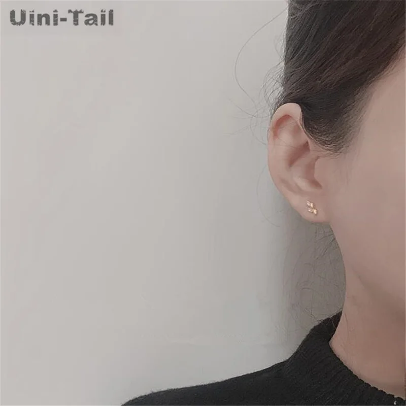 Uini-Tail hot new 925 Tibetan silver leaf earrings fashion simple compact dynamic personality wild leaf earrings JK123