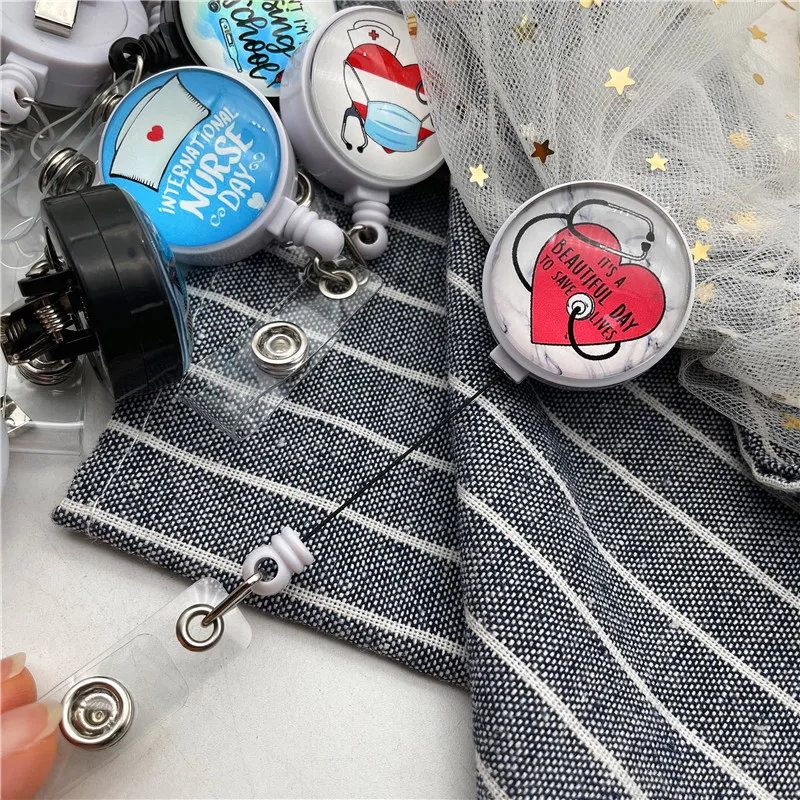 

50Pcs/Lot Retractable Nurse Badge Reel Clip Badge Holder Doctor ID Card Holder Needle Organ Heart Pattern