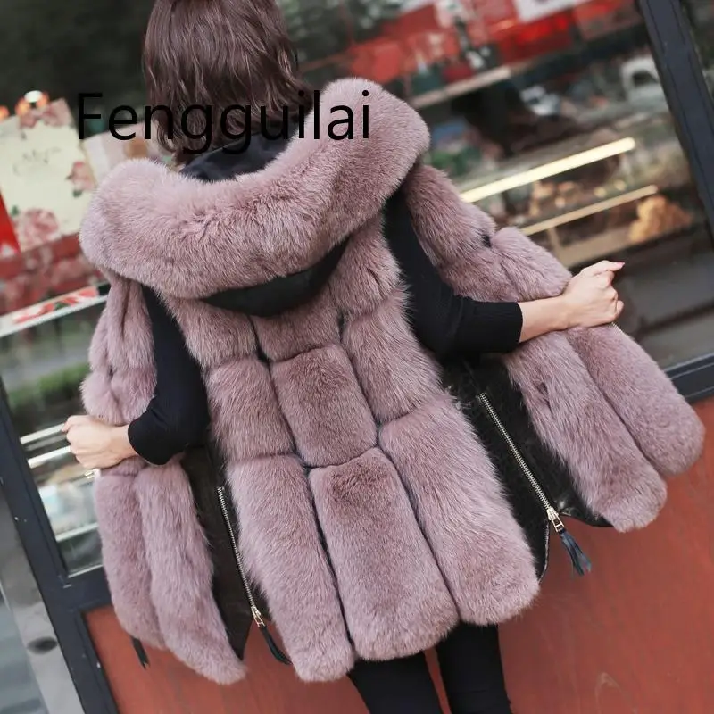 Giacca di pelliccia delle nuove donne di inverno Faux Fox Fur Vest cappotto moda con cappuccio gilet di pelliccia cerniera laterale cuciture in pelle caldo Outwear