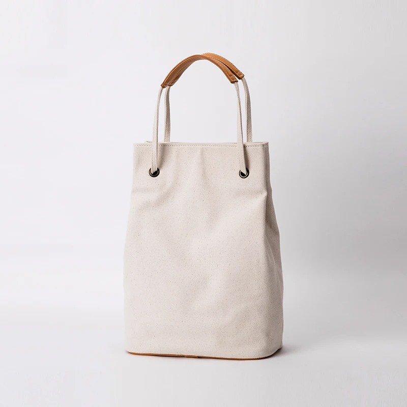 White canvas bag female shoulder art small fresh bucket shoulder bag simple cloth bag 2024 new