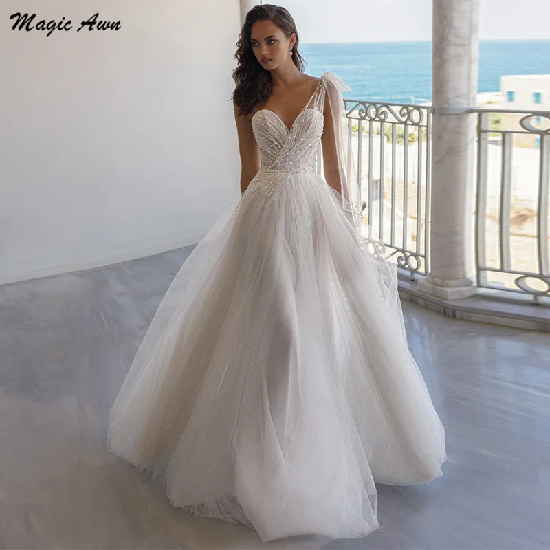 Awn vestido de casamento mágico, um ombro, com pérolas, costas nuas de contas, país de praia, vestido de noiva, ilusionismo de casamento 2021