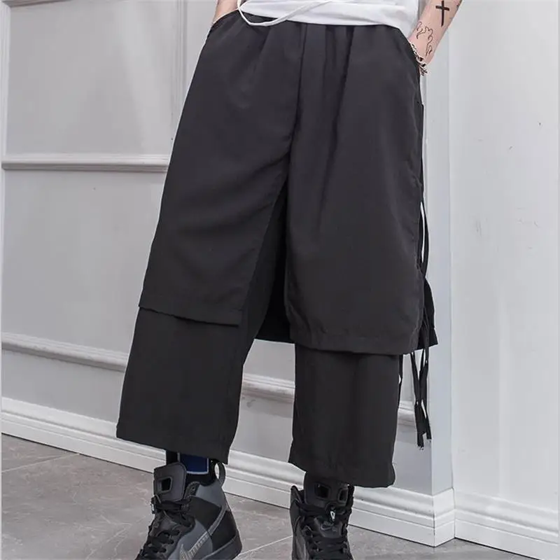 Men's pants spring casual nine - minute pants straight pants man fringe fake two - piece shorts hip hop yamamoto style