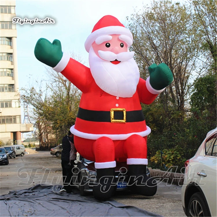 Customized Advertising Inflatable Santa 4m High Red Air Blown Sitting Father Christmas For Outdoor Building Roof Decoration