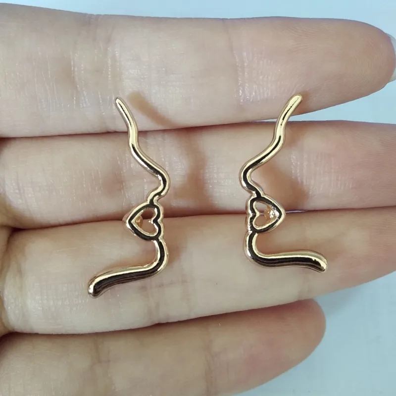E240 Simple Popular Heart Face Abstract Outline Alloy Studs Earrings For Women Fashion Jewelry wholesale