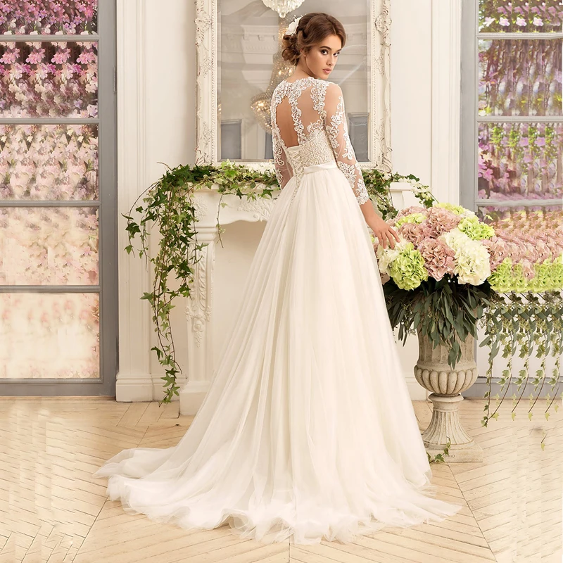 Prachtige Lange Mouwen Trouwjurken O-hals Kant A-lijn Tulle Bridal Gown Applique Trouwjurk Gewaad Mariee